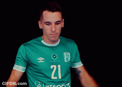 Man In Green Shirt Number 21 GIF