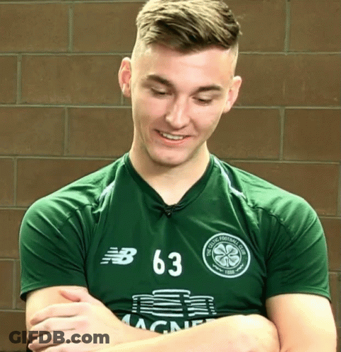 Man In Green Shirt Number 63 GIF