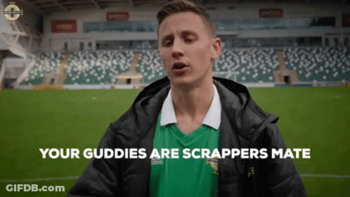 Man In Green Shirt On Soccer Field Saying Your Guddies Are Scrappers Mate GIF