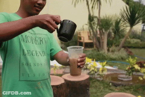 Man In Green Shirt Pouring Coffee Modern Legend Sounds Vision GIF