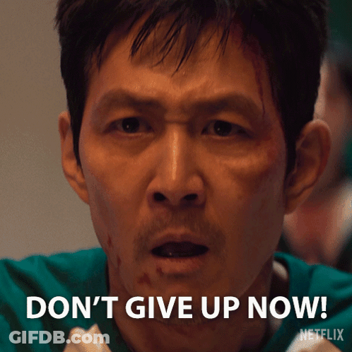 Man In Green Shirt Saying Don't Give Up Now GIF