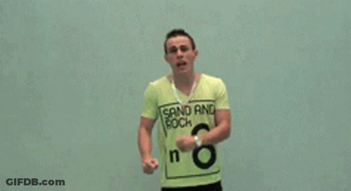 Man In Green Shirt Saying Grand And Rock GIF