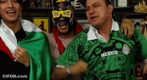 Man In Green Shirt Saying Mexico With Two Men GIF