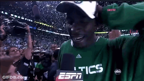 Man In Green Shirt Saying Tics GIF