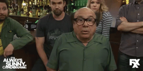 Man In Green Shirt Says Whoops To Crowd GIF