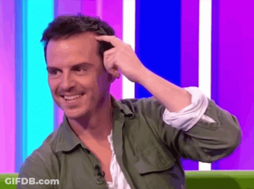 Man In Green Shirt Scratching Head GIF