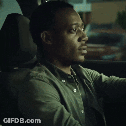 Man In Green Shirt Sitting In Car GIF