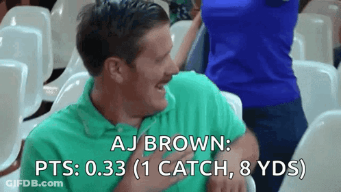 Man In Green Shirt Sitting In Stadium Saying AJ Brown Pts 0.33 GIF
