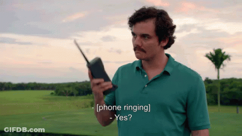 Man In Green Shirt Walkie Talkie Phone Ringing GIF