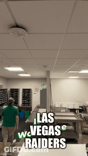 Man In Green Shirt Walking Las Vegas Raiders GIF