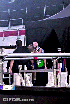 Man In Green Shirt With Flower GIF