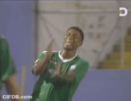 Man In Green Shirt With Letter C GIF