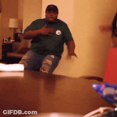 Man In Green Shirt With Letter O Dancing GIF