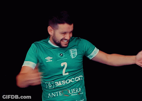 Man In Green Shirt With Number 2 Smiling GIF