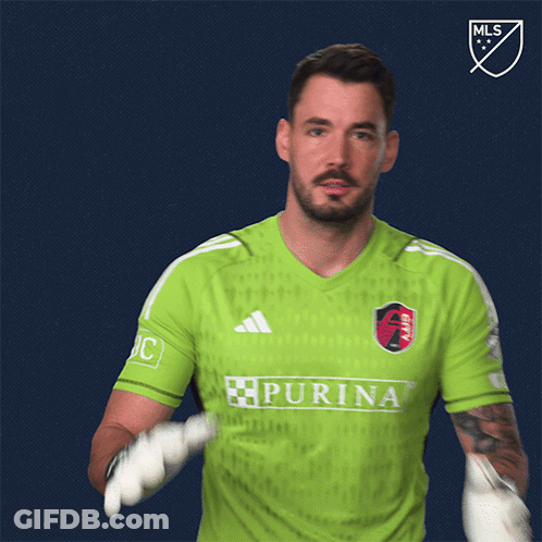 Man In Green Shirt With Purina GIF