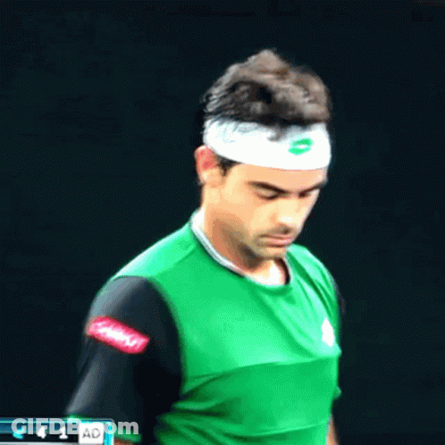 Man In Green Shirt With White Headband Letter O GIF