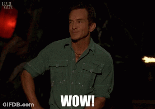 Man In Green Shirt With Wow On Chest GIF