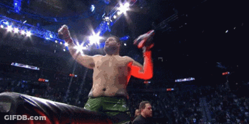 Man In Green Shorts Standing In Boxing Ring GIF