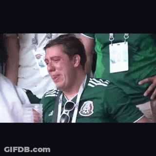 Man In Green Soccer Jersey Crying In Stands GIF