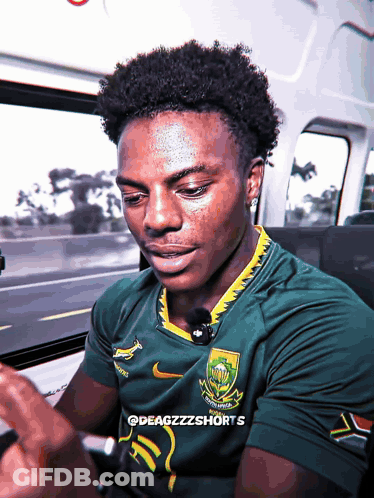 Man In Green South Africa Jersey On Phone GIF