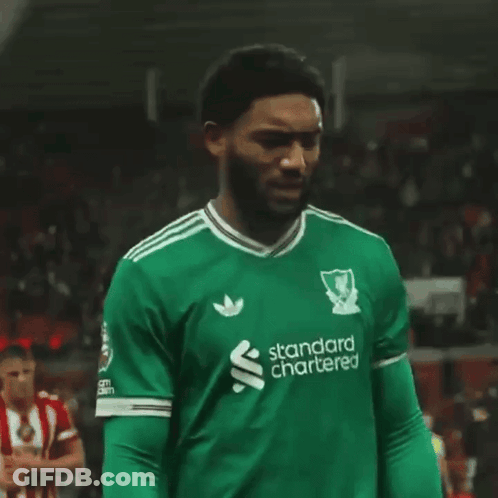 Man In Green Standard Chartered Jersey GIF