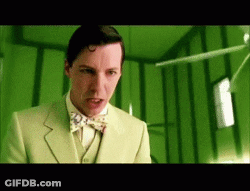 Man In Green Suit And Bow Tie GIF