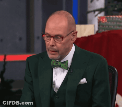 Man In Green Suit And Bow Tie Smiling GIF