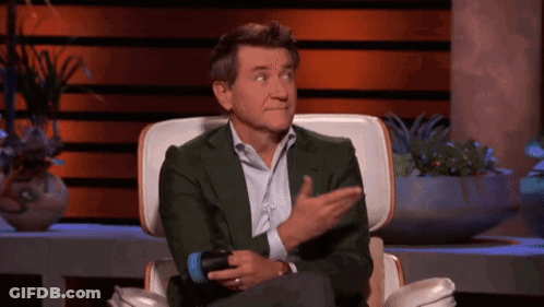 Man In Green Suit Holding Microphone Funny Face GIF