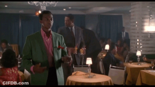 Man In Green Suit Next To Other Man Saying My Love GIF