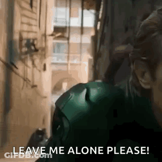 Man In Green Suit Saying Leave Me Alone GIF