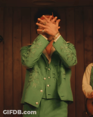 Man In Green Suit With T GIF