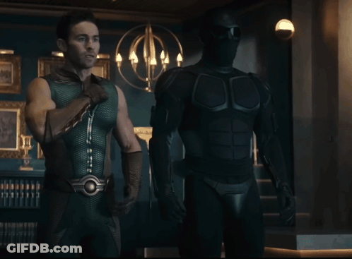 Man In Green Superhero Costume GIF