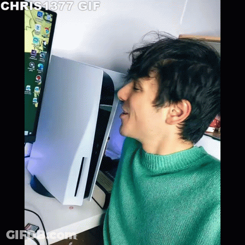 Man In Green Sweater In Front Of Computer Screen Saying Chris1877 GIF