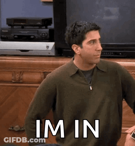 Man In Green Sweater With Im In GIF