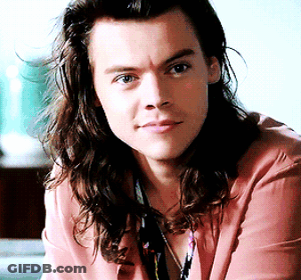 Man In Green Tank Top And Red Pants At Microphone GIF