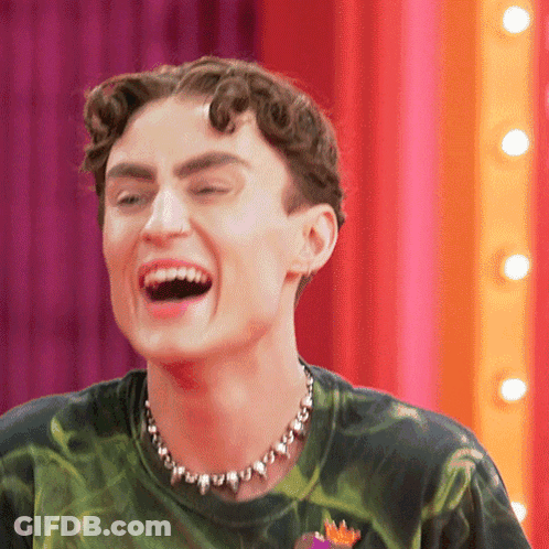 Man In Green Tie Dye Shirt Laughing GIF
