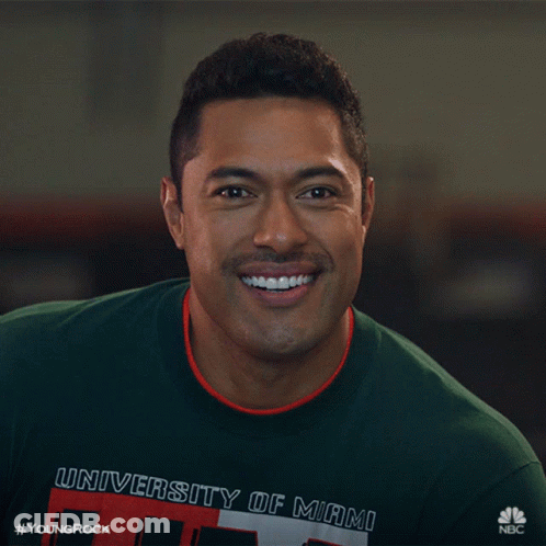 Man In Green University Of Miami Shirt Smiling GIF