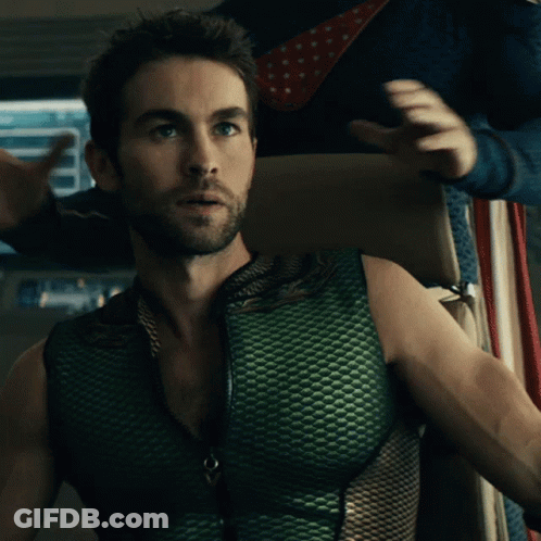 Man In Green Vest Comforted By Man In Blue Suit GIF
