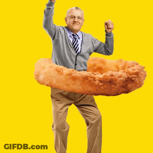 Man In Grey Cardigan And Tie Holding Fried Onion Ring GIF