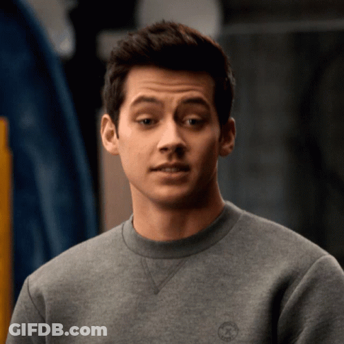 Man In Grey Converse Logo Sweatshirt GIF