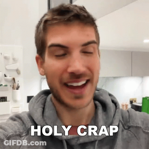 Man In Grey Hoodie Saying Holy Crap GIF