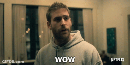 Man In Grey Hoodie Saying Wow GIF