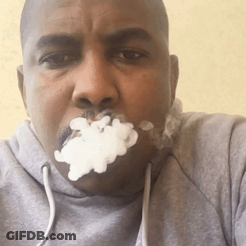 Man In Grey Hoodie Smoking Cigarette GIF
