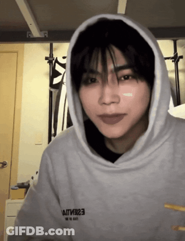 Man In Grey Hoodie With Essentials GIF