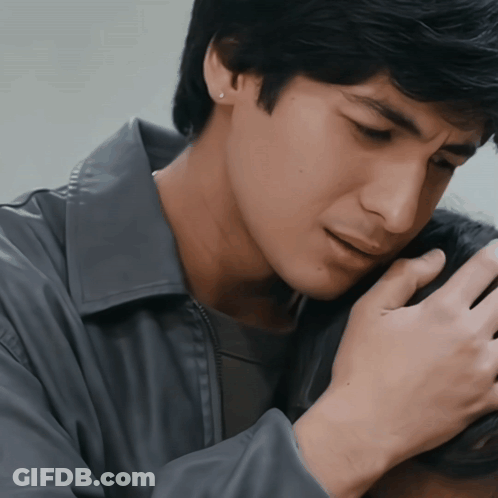 Man In Grey Jacket Holding Another Man's Head GIF