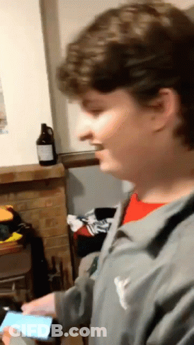 Man In Grey Jacket With Y GIF