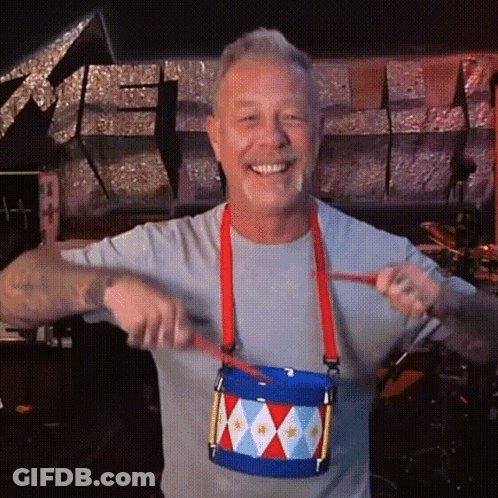 Man In Grey Shirt Playing Small Blue Drum GIF