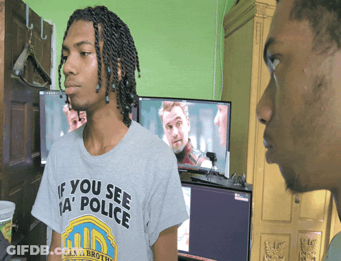 Man In Grey Shirt Saying If You See A Police Turn A Broth GIF