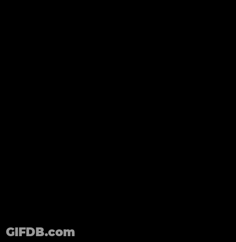 Man In Grey Shirt Smiling In Front Of Blue Brawl Stars Background GIF