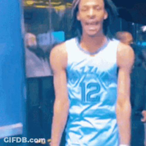 Man In Grey Shirt Standing GIF